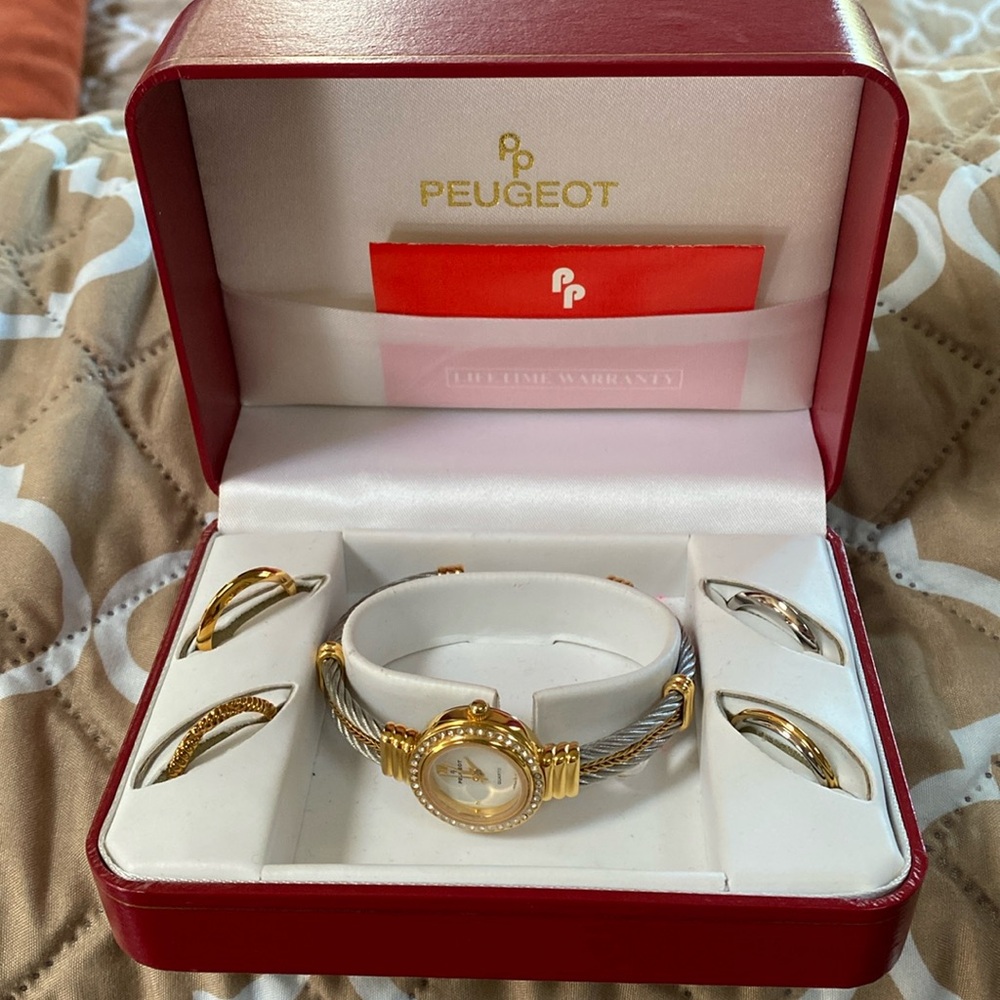 Ladies Peugeot watch with interchanges bezels